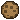 small illustration of a chocolate chip cookie